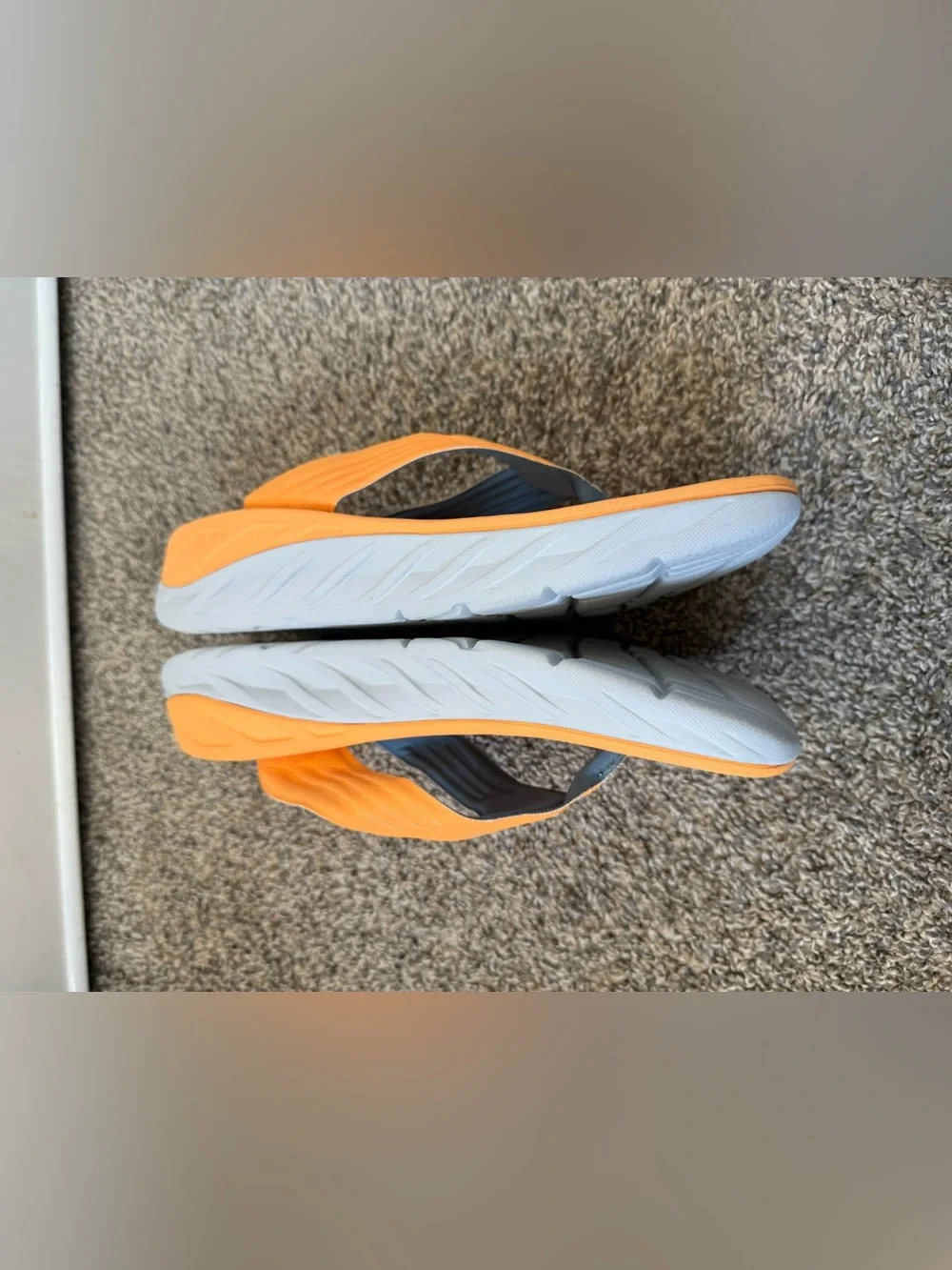 Hoka  size 11 men’s Orange and Blue Flip-Flop Sandals